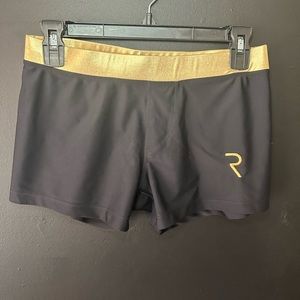 Ruff skin, black, and gold swimsuit